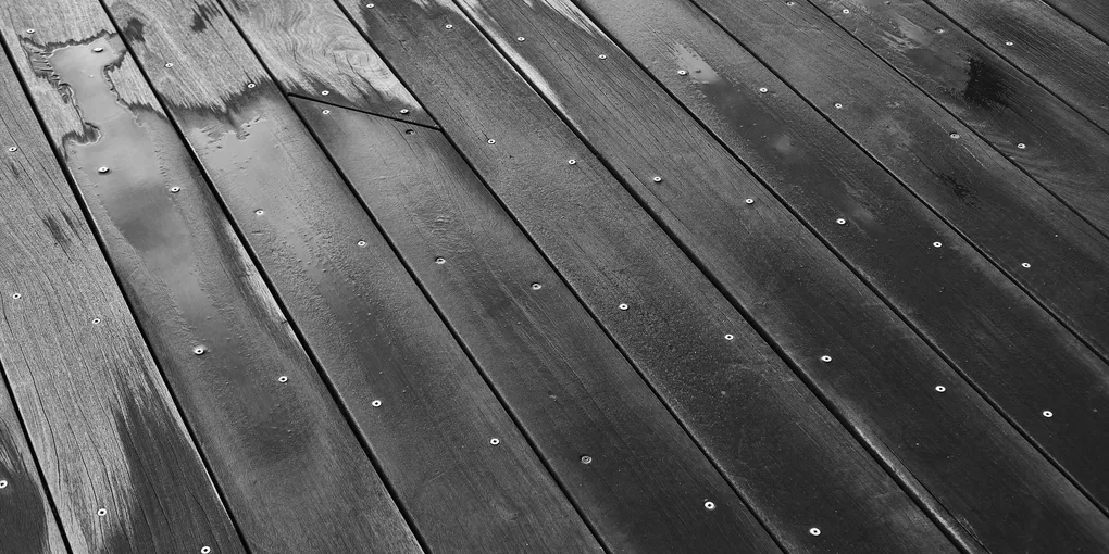 Deck Staining Cost 2026: $1–$3/sq ft ($300–$900 for 300 sq ft)