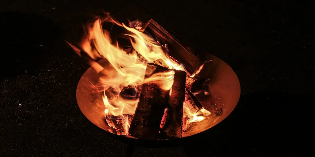 Fire Pit Installation Cost 2026: $300–$6,000 Wood or Gas