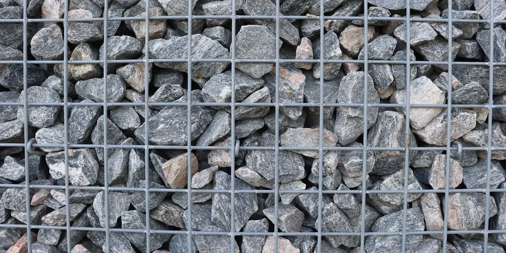 How to Build a Retaining Wall: Block, Timber, and Stone Options for DIYers