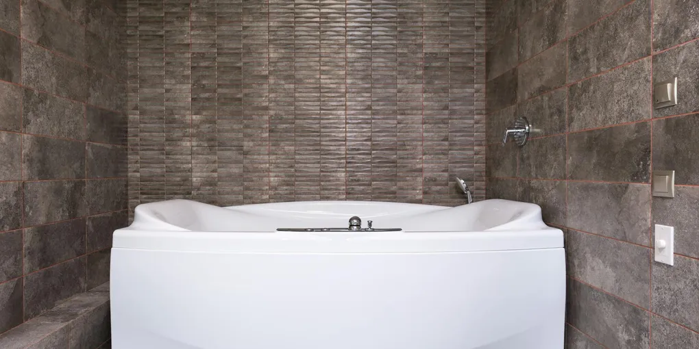 How to Fix a Cracked Bathtub: Fiberglass, Acrylic, and Porcelain Repair
