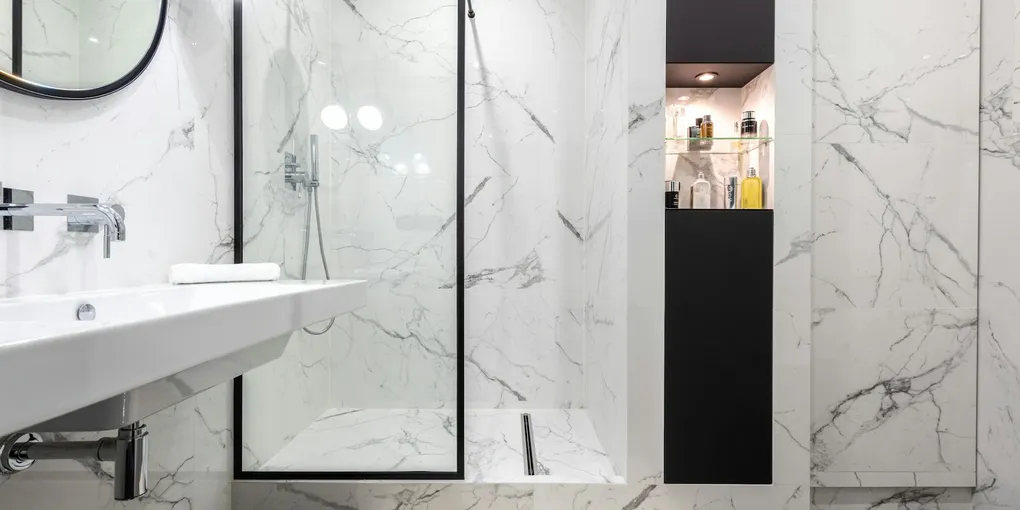 How to Fix a Leaking Shower Pan: Crack Repair, Liner Replacement, and Re-Grouting (2026)