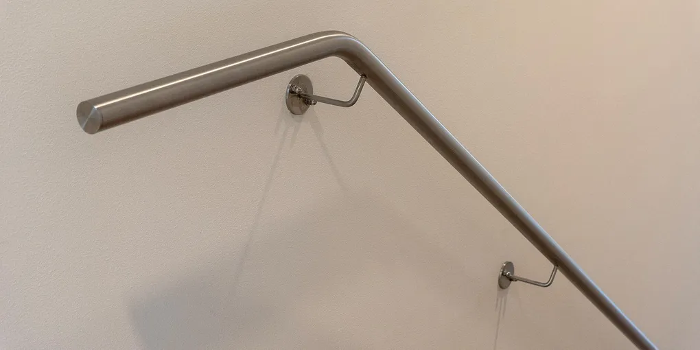 How to Fix a Loose Handrail: Wall Brackets, Newel Posts, and Wood Repairs