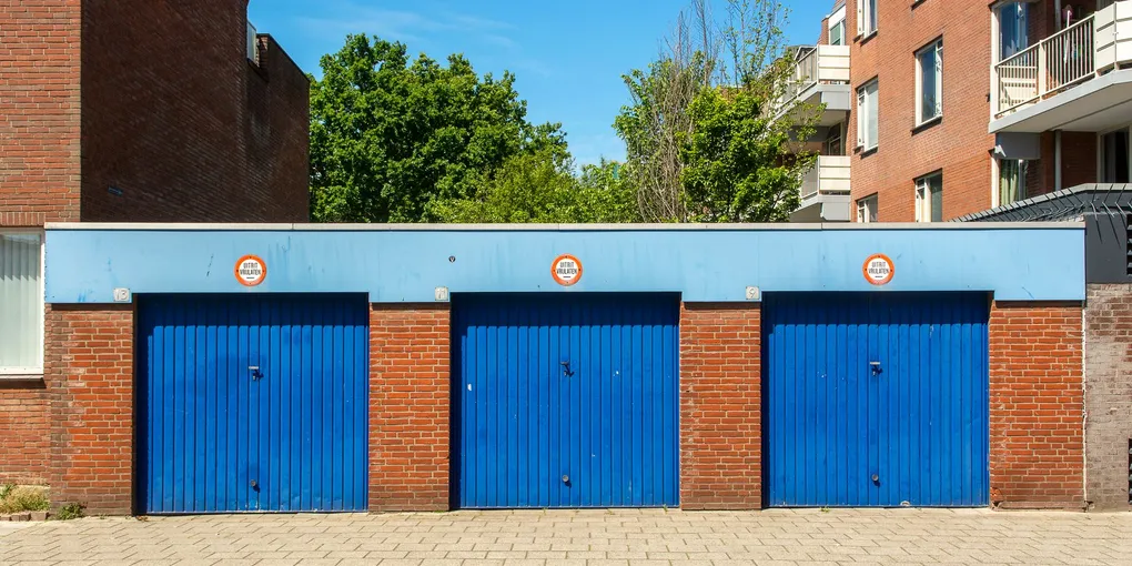 How to Fix a Squeaky Garage Door: Lubrication, Hardware, and Roller Replacement