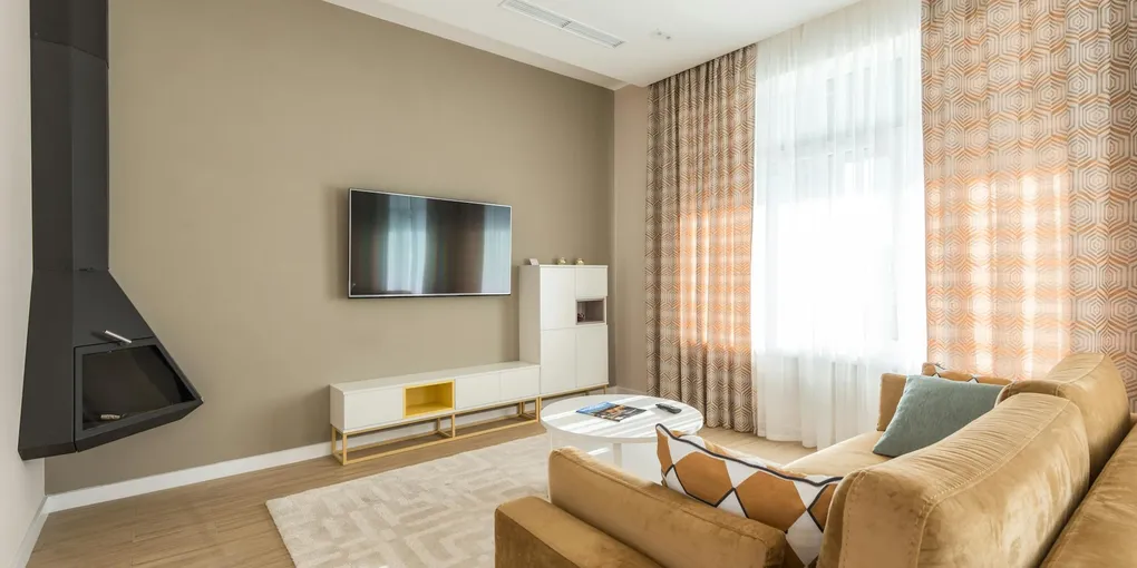 How to Mount a TV on the Wall: Finding Studs, Choosing a Bracket, and Cable Management (2026)