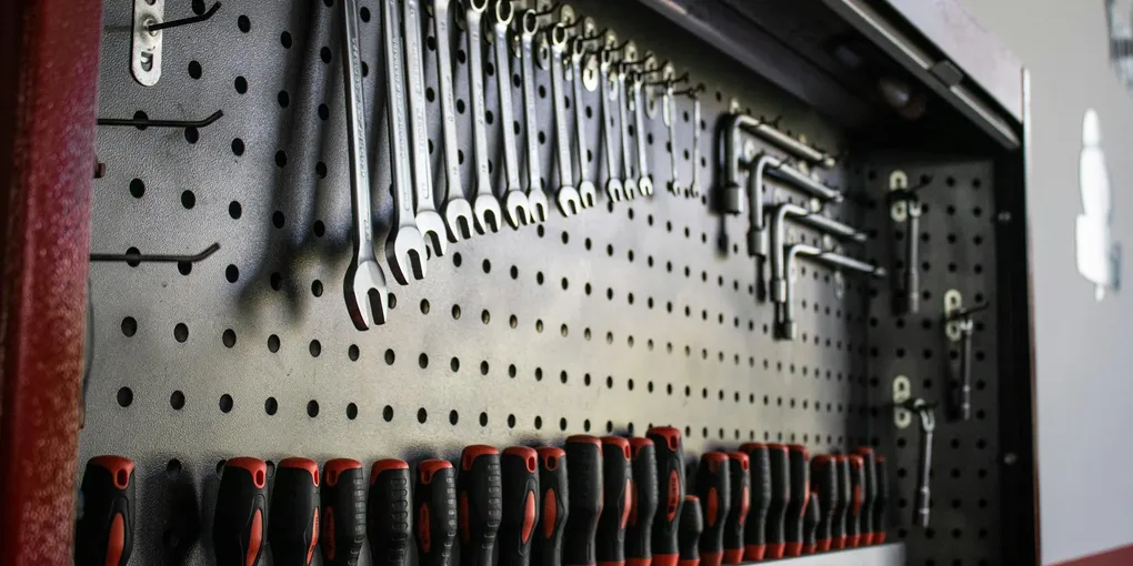 How to Organize a Garage: Zone Planning, Wall Storage, and Overhead Systems