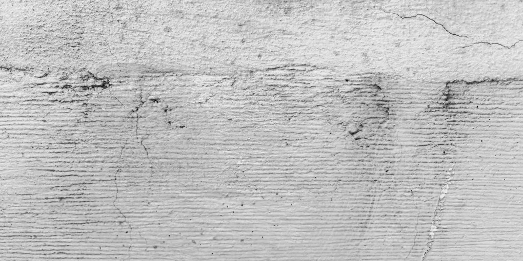 How to Repair a Concrete Driveway: Cracks, Spalling, and Resurfacing