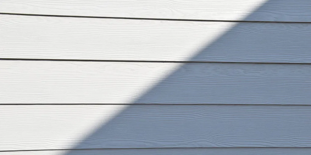 Siding Repair Cost 2026: $300–$1,500 by Material and Damage